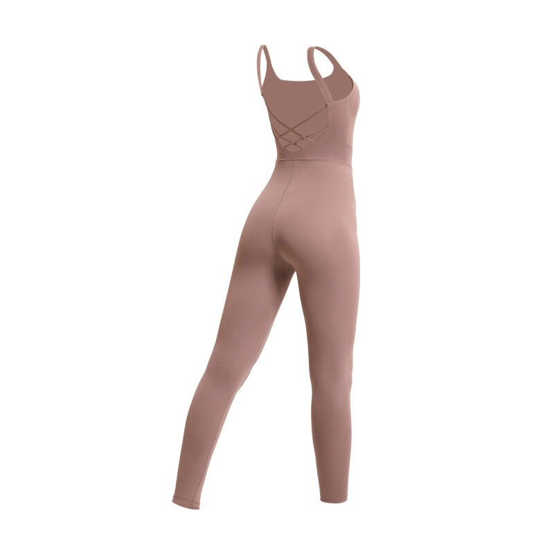 Stylish elastic women's open back fitness jumpsuit in solid color, perfect for yoga, breathable and quick-dry fabric for activewear.